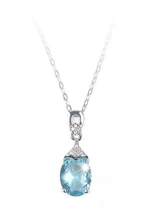 Нежное ожерелье с голубым кристаллом2 фото