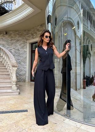 Женский костюм брюки палаццо и жилетка на пуговицах