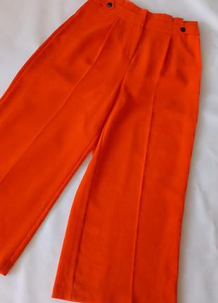 Яркие оранжевые широкие брюки р.12