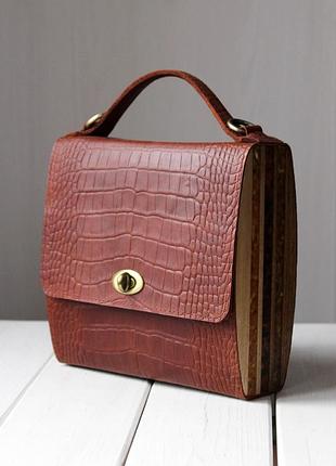 Ексклюзивна шкіряна жіноча сумка з дерев`яними боковинами та вставками з бурштину
