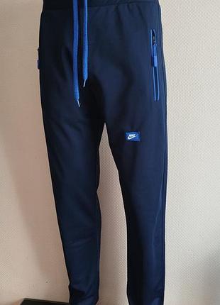 Мужские спортивные штаны nike из ткани лакоста.