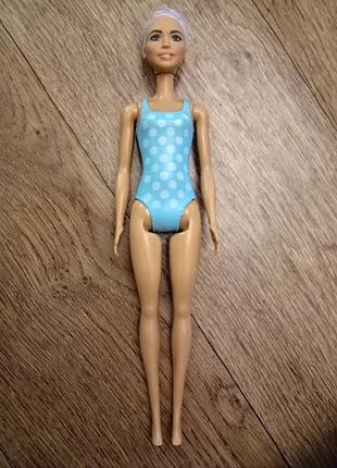Барби. the barbie color reveal beach to party doll.