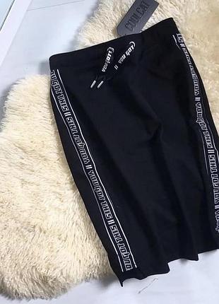 Спортивна юбка нова з лампасами