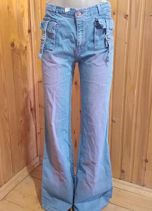 Джинсы клеши