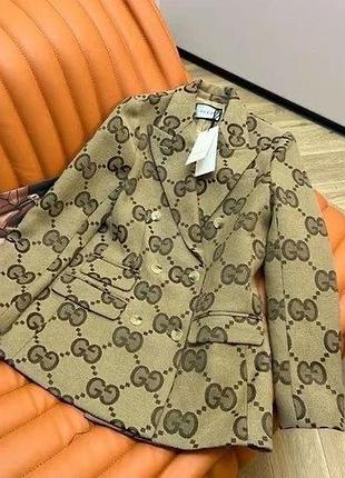 Брючний костюм gucci піджак та брюки палацо