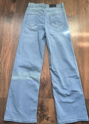 Джинсы голубые 4