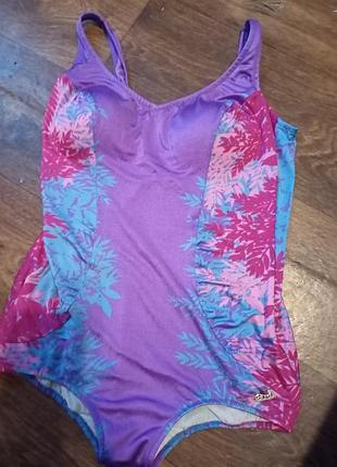 Слитный купальник шортами для женщины