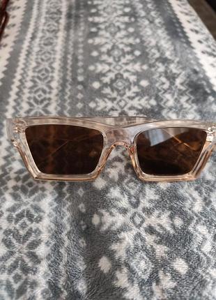 Окуляри сонцезахисні з прозорою оправою