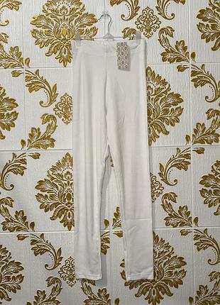 Білі лосини в рубчик