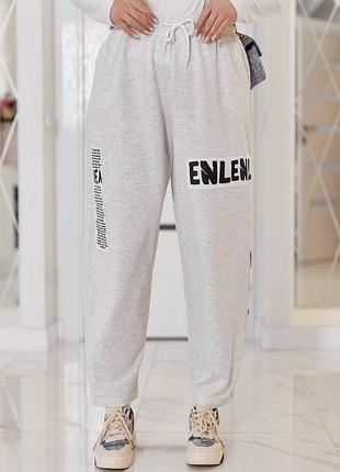 Широкі спортивні штани батал з принтами жіночі зручні весняні