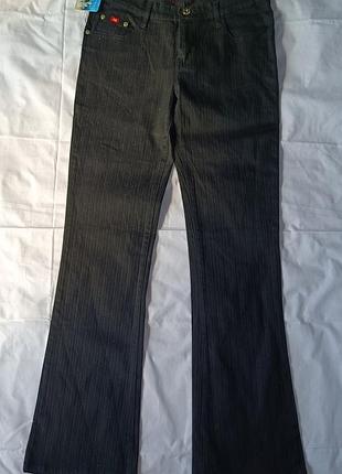 Женские брюки расклешоного кроя. польша