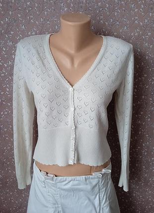 Біла ажурна трикотажна кофтинка