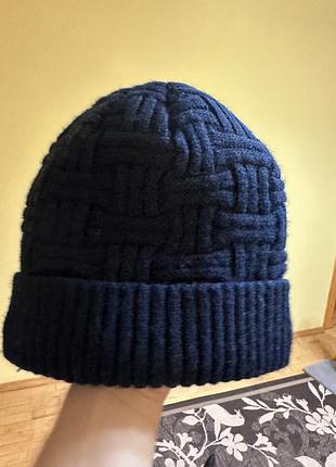 Утеплена зимова шапка
