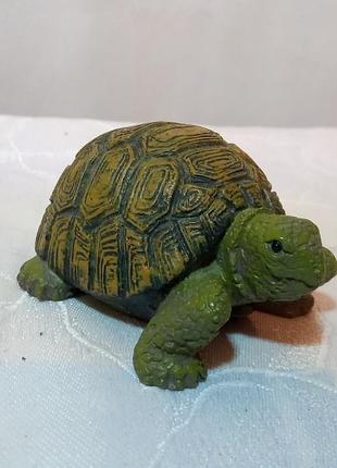 Каменная фигурка черепахи
