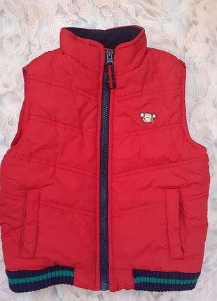 Жилет, безрукавка