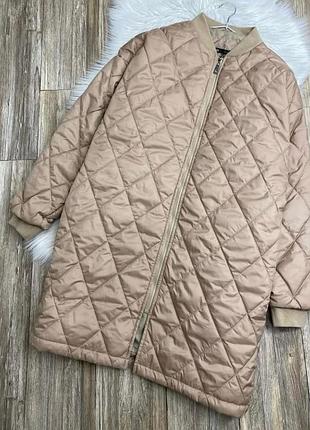 Стьобана куртка подовжена