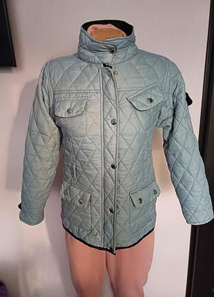 Жіноча стьобана куртка