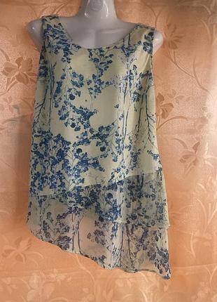 Блуза бренда per una, пог-52, поб-56, длина-70, внизу воланы шелк