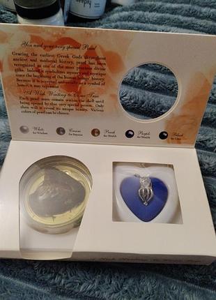 Цепочка с жемчужиной в ракушке