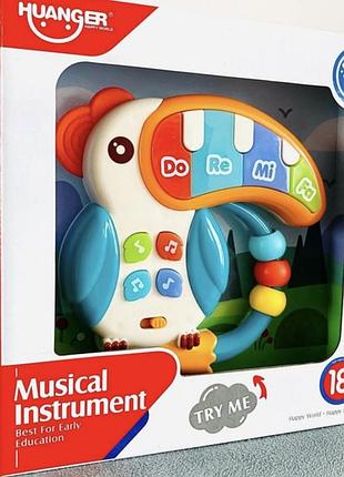 Игрушка музыкальная тукан