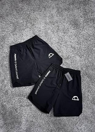 Manto  shorts defend 4