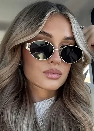 Солнцезащитные очки женские в металлической оправе
