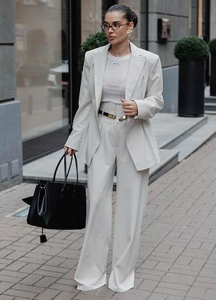 Широкие классические брюки палаццо с карманами