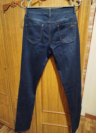 Джинсы новые