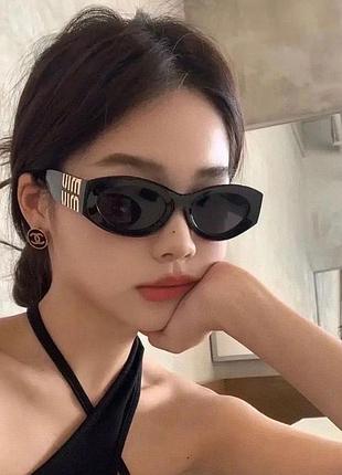 Сонцезахисні окуляри miu miu