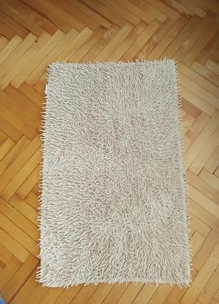 Килимок в ванну