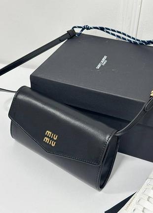 Кожаный клатч известного бренда