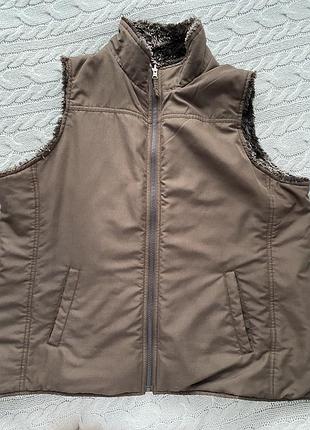 Женская жилетка