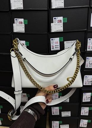 Белая кожаная женская сумка coach