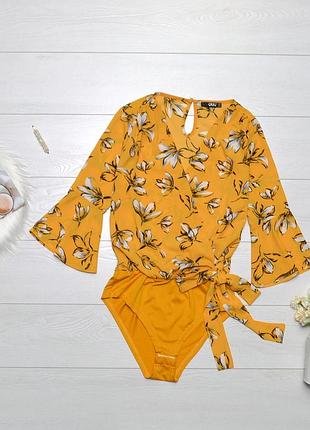 Красиве боді в квітковий принт quiz.