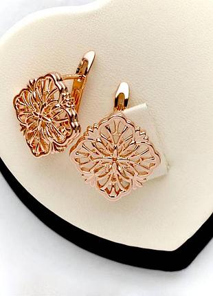 Красиві різьблені сережки фірма fallon (медичне золото)