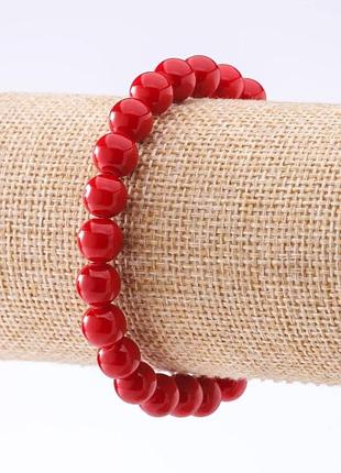Браслет корал (прес) на резинці d-8мм l - 18см