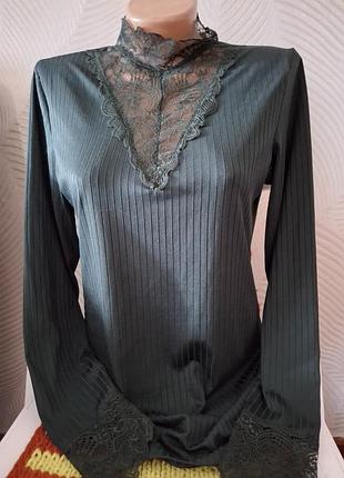 Темно зеленый гольф кружево