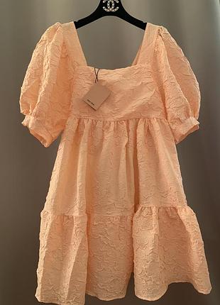 Плаття miu miu рожево-персикового кольору з бантом на спинці