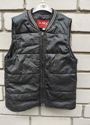 Жилетка дитяча фірми kikq, країна виробник китай.