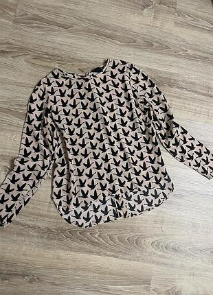 Стильная блуза в птичку