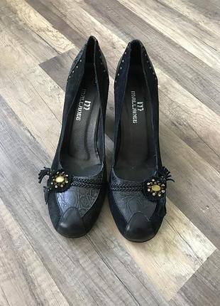 Туфлі на підборах на каблуках