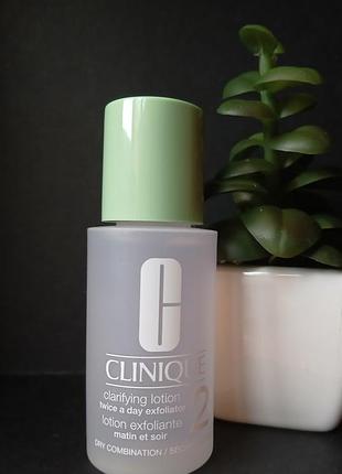 Clinique очищувальний лосьйон ексфоліант для сухої та комбінованої шкіри