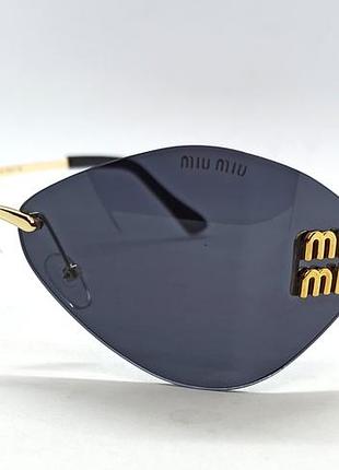 Miu miu очки женские солнцезащитные черные закругленные безоправные