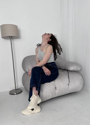 Сріблястий боді на одне плече від бренду divided