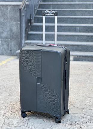 М 004 серый средний дорожный чемодан marsel m на 4 колесах, 75 л, полипропилен