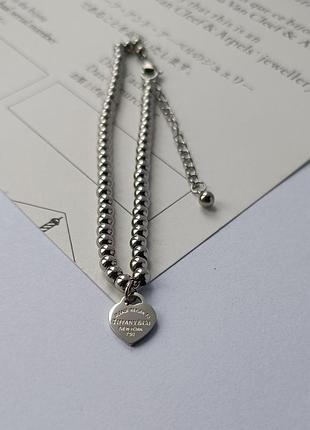 Браслет с сердцем в стиле бренда4 фото