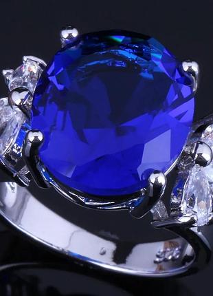 Кольцо с синими сапфирами и фианитами
