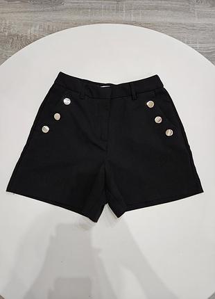 Шорти з ґудзиками жіночі