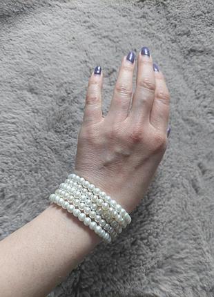 Стильный нарядный нежный комплект браслетов из жемчужин