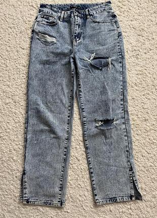 Рваные джинсы